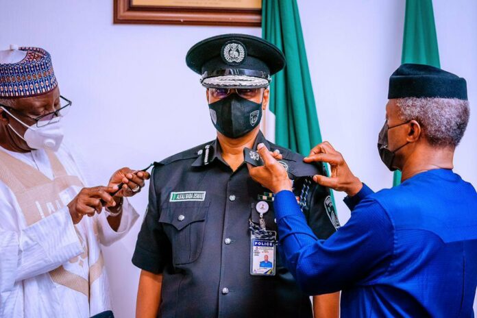 VP Osinbajo Decorates New Police IG, Usman Alkali Baba-Brand Spur Nigeria